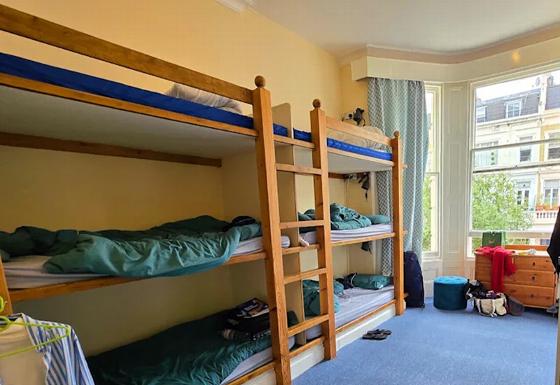 group of friends sharing laughter while enjoying coffee and drinks in a cozy setting with warm atmosphere and cheerful expressions 4 friends smiling